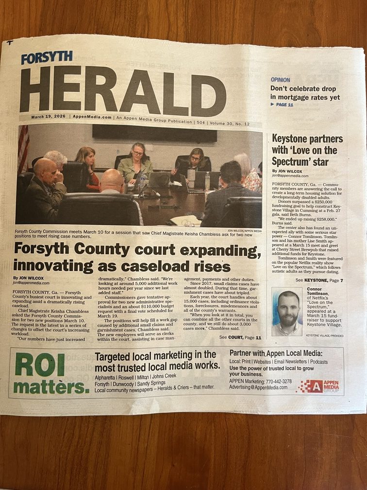 Front page of the Forsyth Herald newspaper with a feature story titled "Keystone partners with ‘Love on the Spectrum’ star," detailing a successful